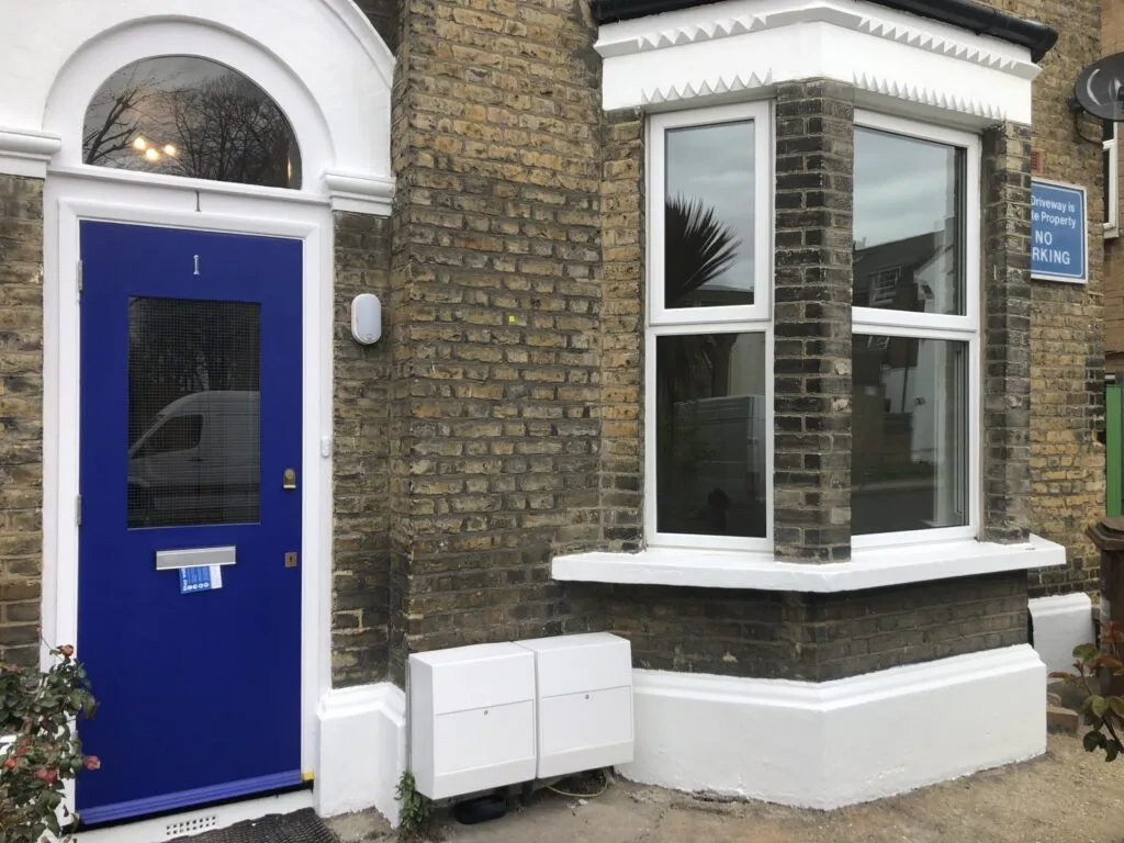 Main entrance into house, exterior door installation Main entrance into house, exterior door installation