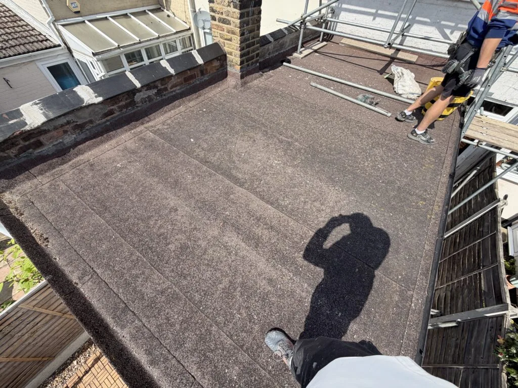 Flat roof repairing work, Custom House, E16 (before)