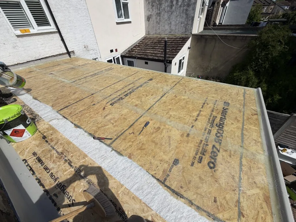 Flat roof repairing work, Custom House, E16 (before)