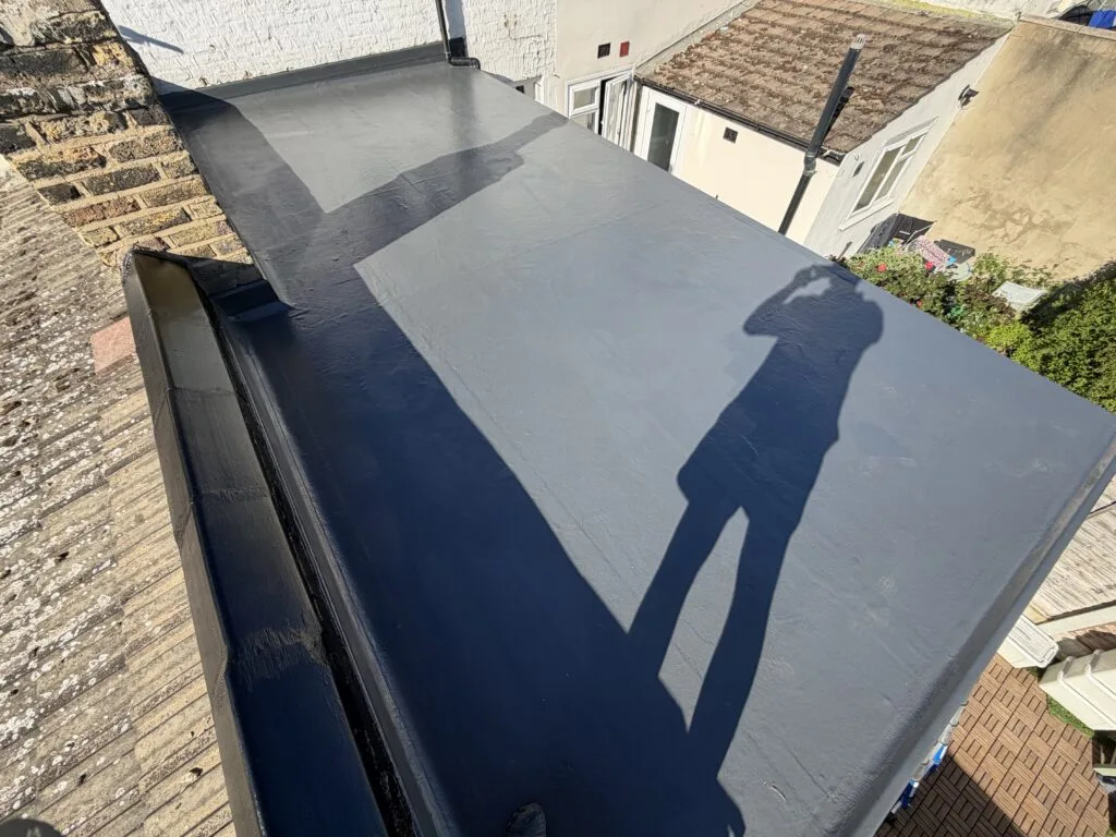 Flat roof repairing work, Custom House, E16