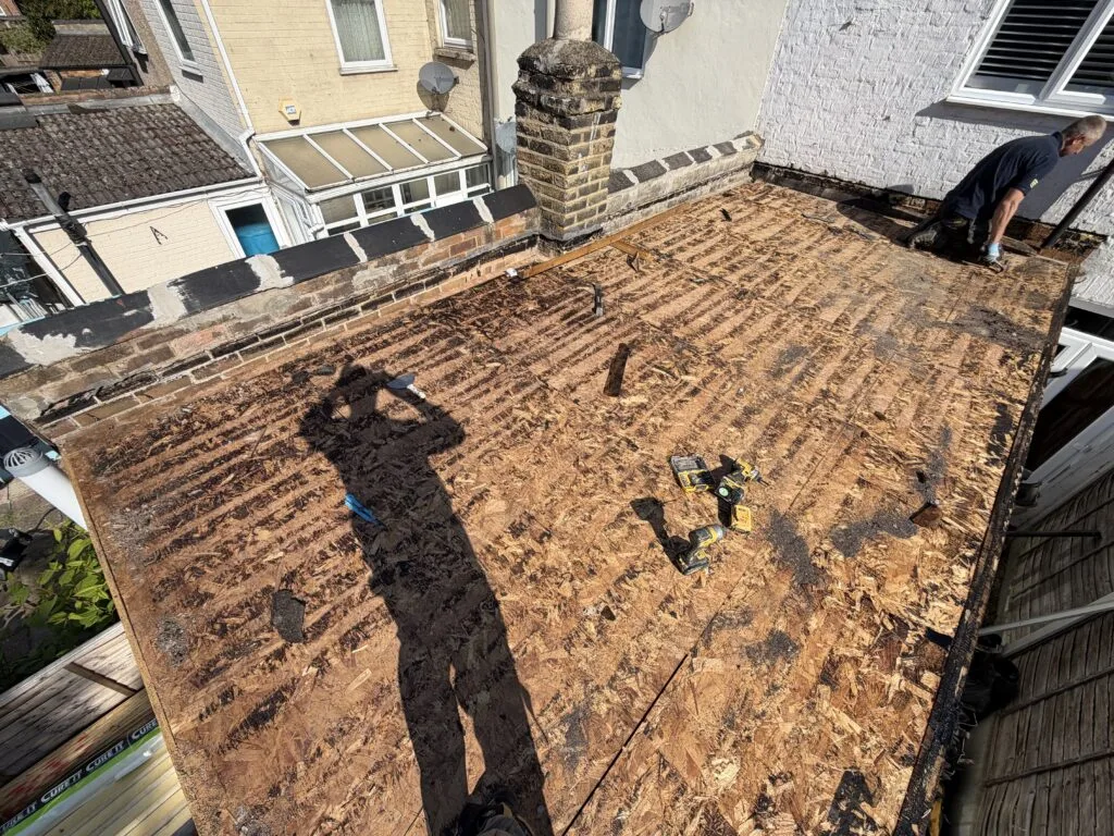 Flat roof repairing work, Custom House, E16 (before)