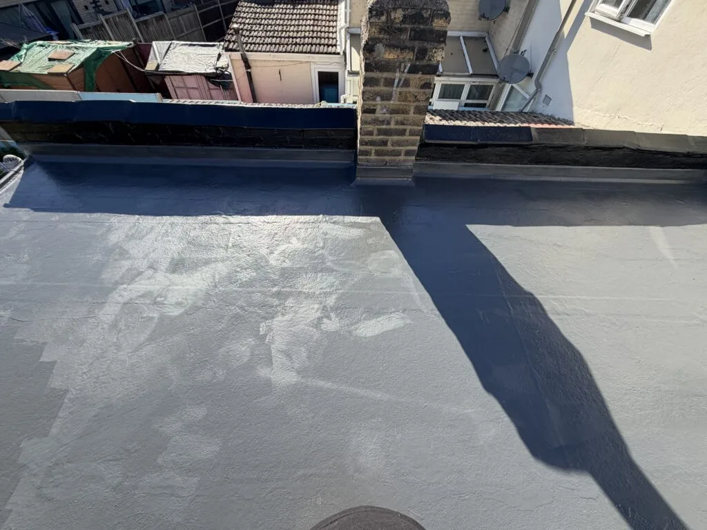 Flat roof repairing work, Custom House, E16