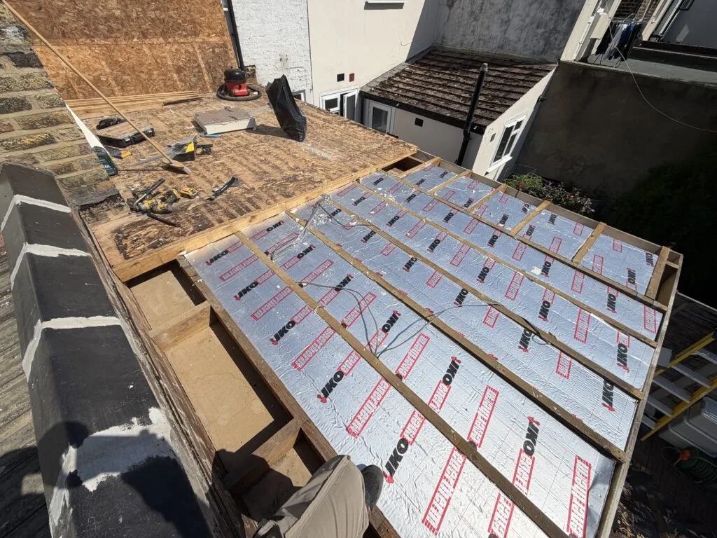 Flat roof repairing work, Custom House, E16 (before)